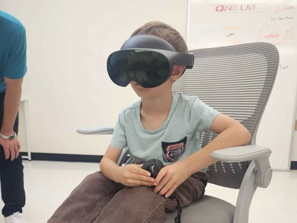 A child trying the VR headset