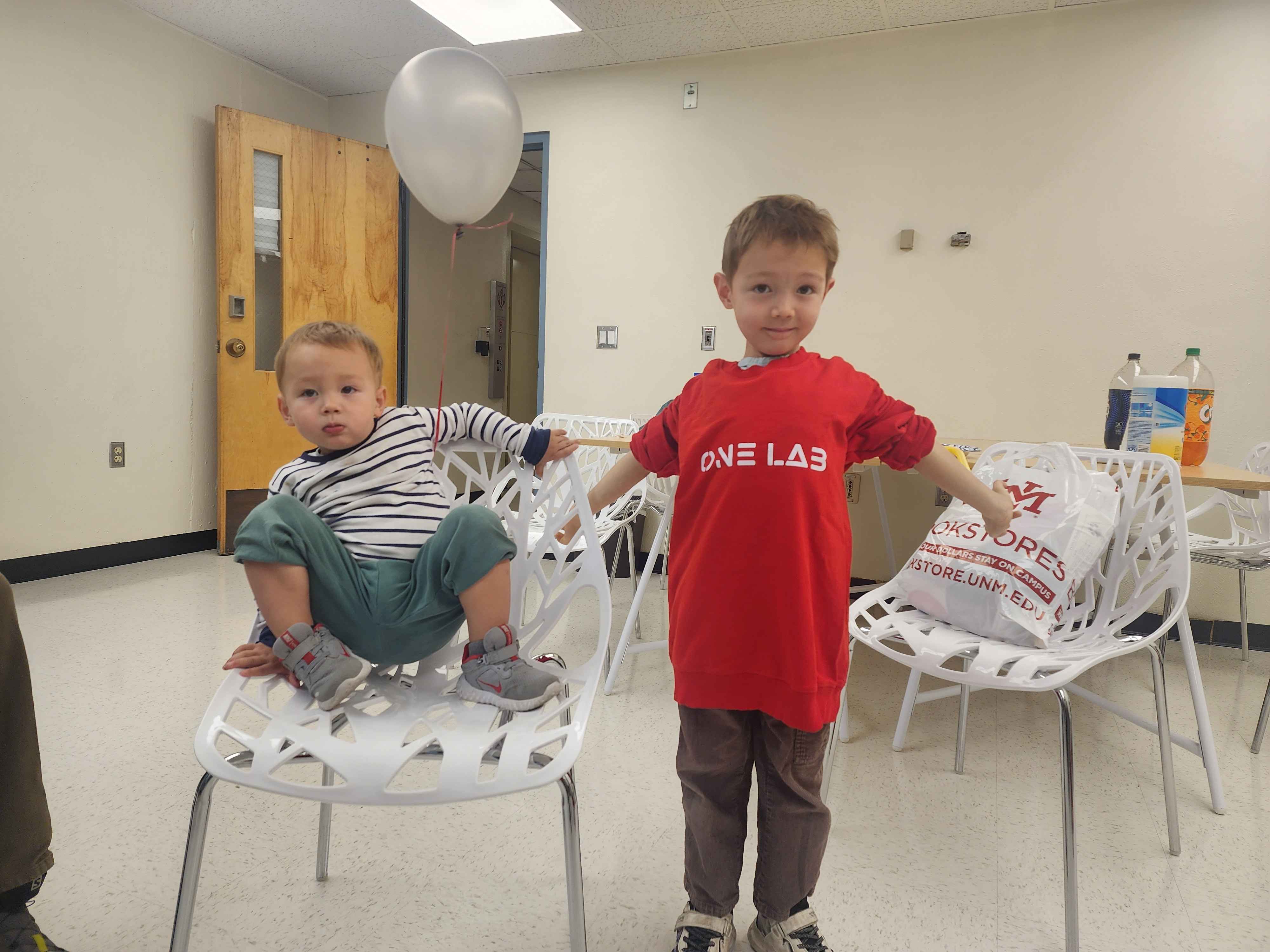 Kids wearing ONE Lab t-shirts